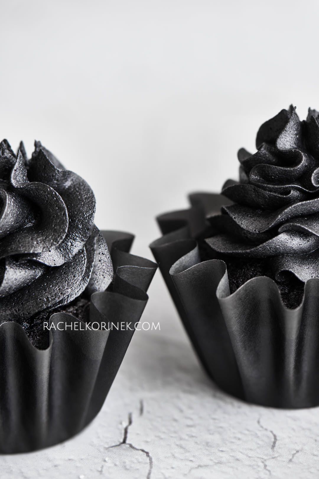 Black chocolate devils food cupcakes. An upclose macro shot. There isn't any colour to this photo so it appears black and white even thought it's real food!