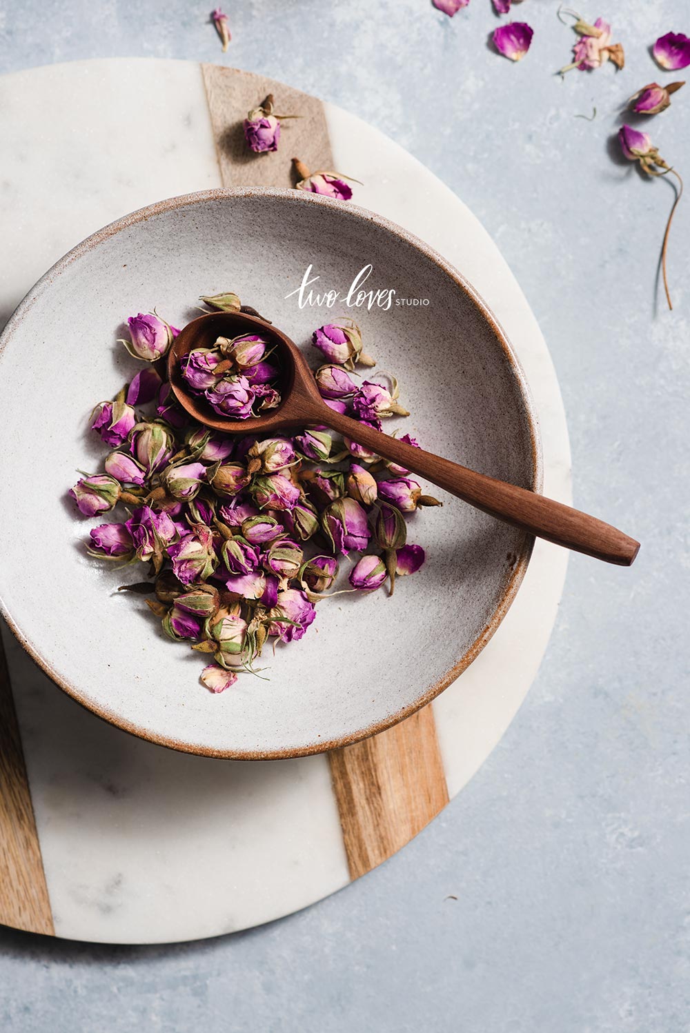 Bowl full of dried rosebuds 