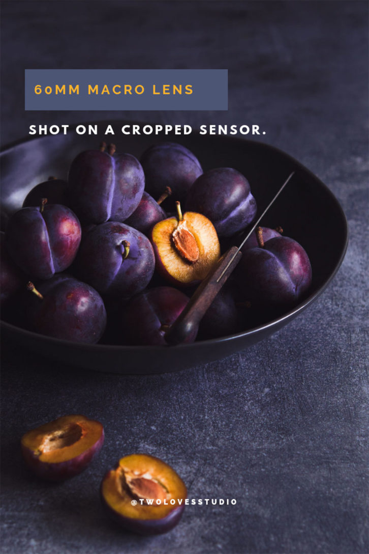 60mm macro lens shot of a plum stone fruit in a bowl. 