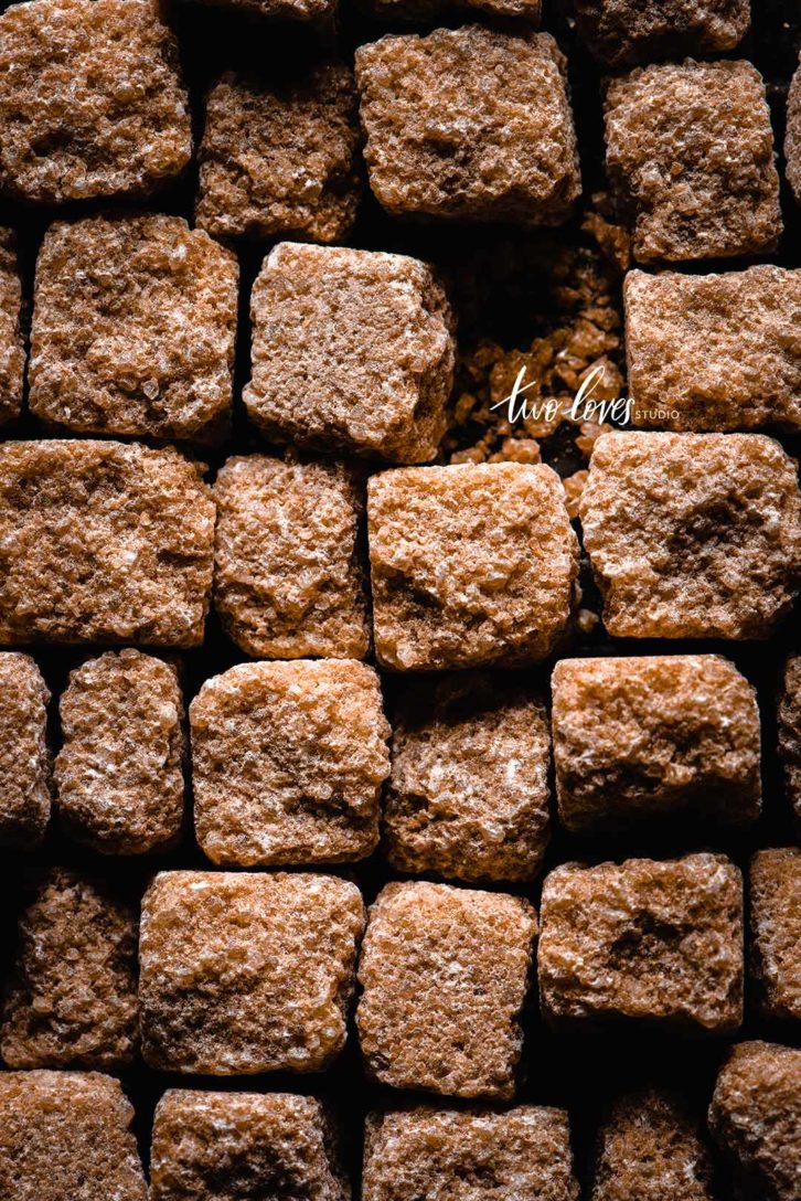 Close up shot of brown raw sugar cubes