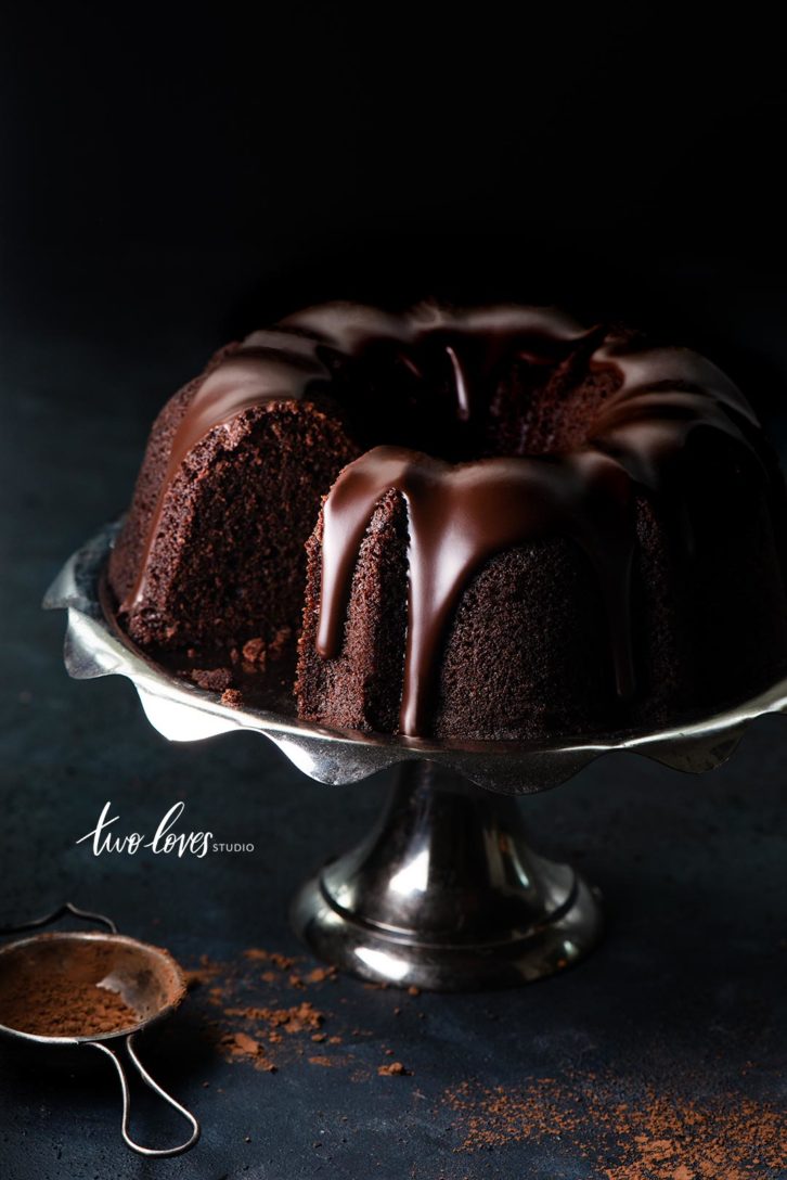 Chocolate bundt cake on a cake platter.