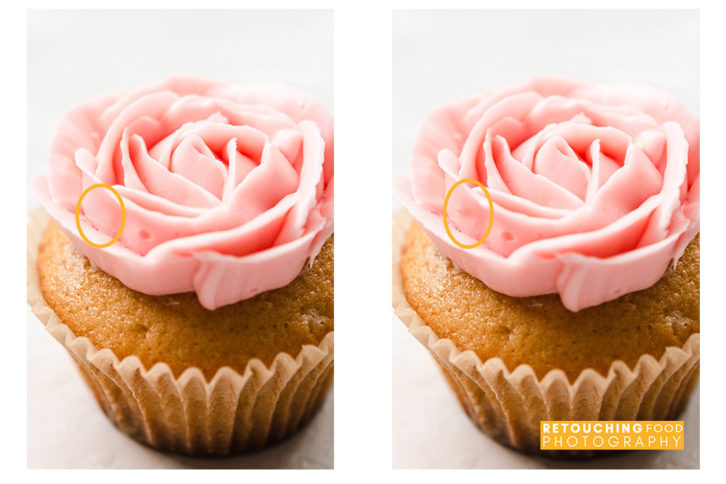 Two cupcakes side by said with a light pink rose piped on top.