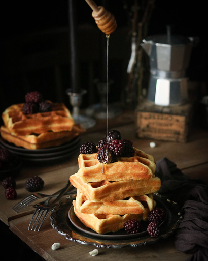 Waffles with Berries by Monique Polanco.
Food photo shot with Canon EF Lens 50mm 1:18 STM. A blog post talking about favourite food photography lenses