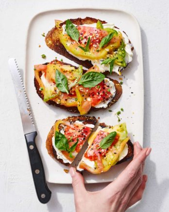 Tomatoes on Toast by Joanie Simon. 
Food photo shot with NIKKOR Z 24-70mm f/2.8 S