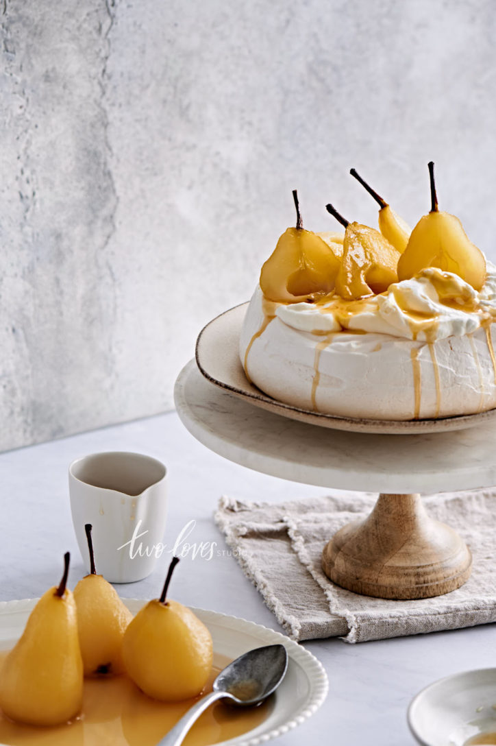 Meringue with poached pears ontop.  lens professional food photographer