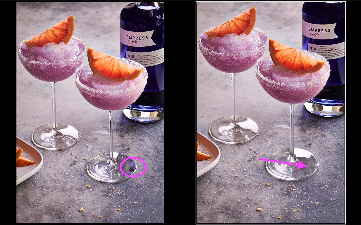 Drink photography of two frozen purple empress cocktails with an orange slice on top on a pale backdrop. 