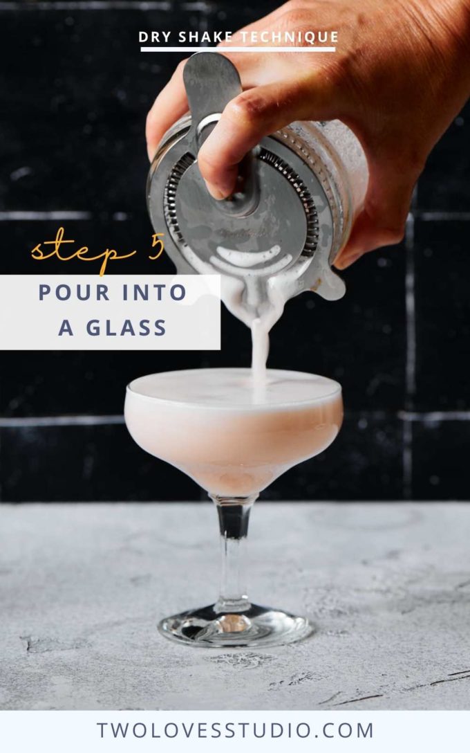 Step by step example. Cocktail liquid being poured from a mason jar on a dark background through a hawthorn strainer.