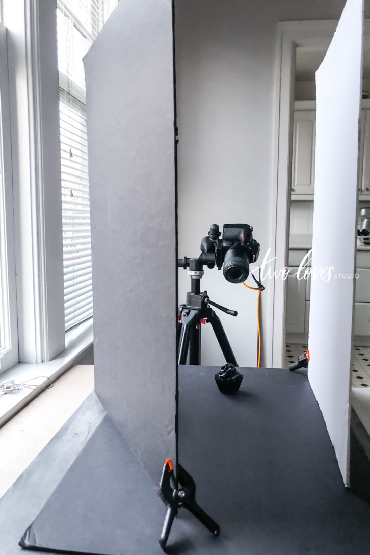 Example of equipment for food photographers. Tripod, camera set up with reflector boards.