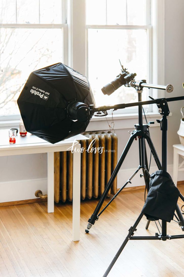 A photo of a 2' Octa Softbox and Boom Stand demonstrating the one light photography setup.