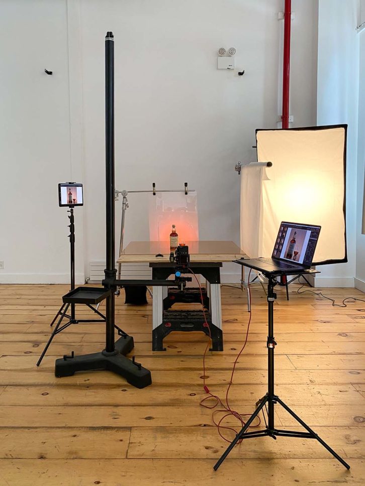 Behind the scene look at a whisky shoot using a softbox setup for product photography.