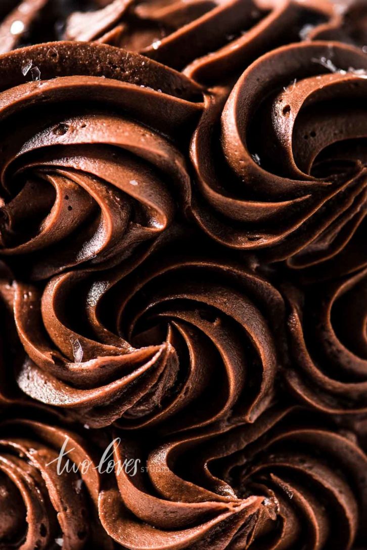 Swirls of chocolate icing and flakes of salt.