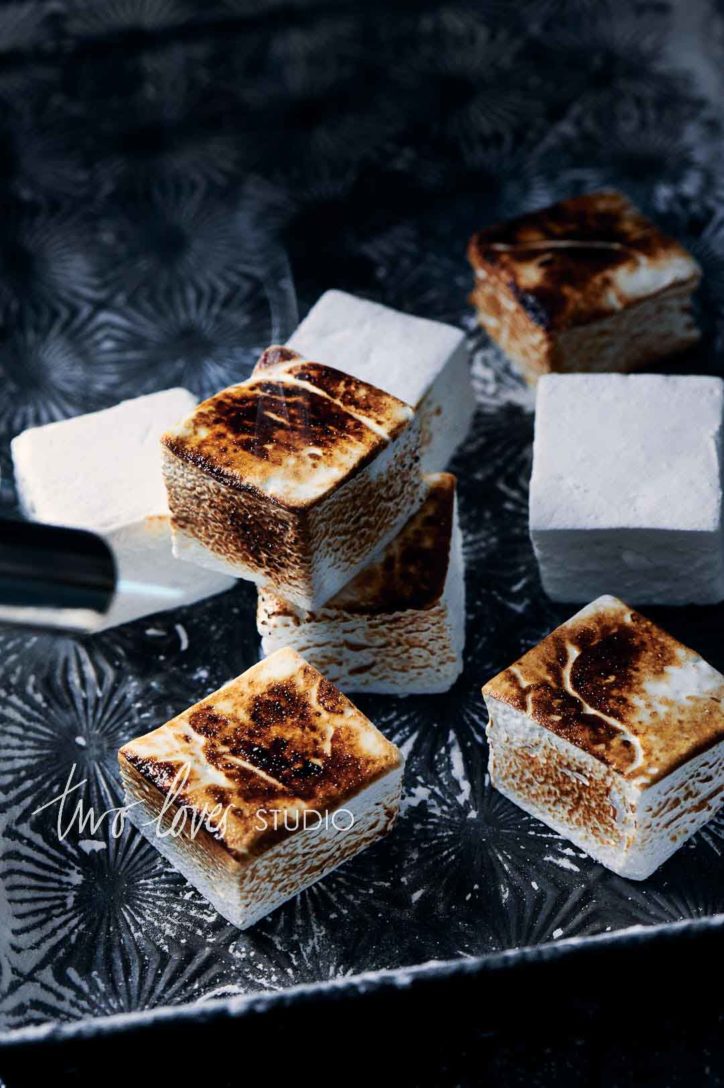 Toasted Marshmallows on a vintage baking tray. One of 6 backdrop ideas for food photography. 
