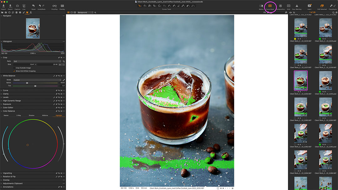 Screenshot showing a small stemless 
glass filled with coffee and ice in capture one editing software. 