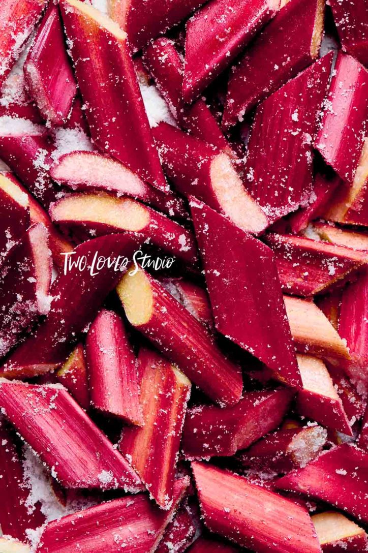 Red rhubarb with sugar dusted pieces in a close up shot demonstrating the use of modifiers for food photography