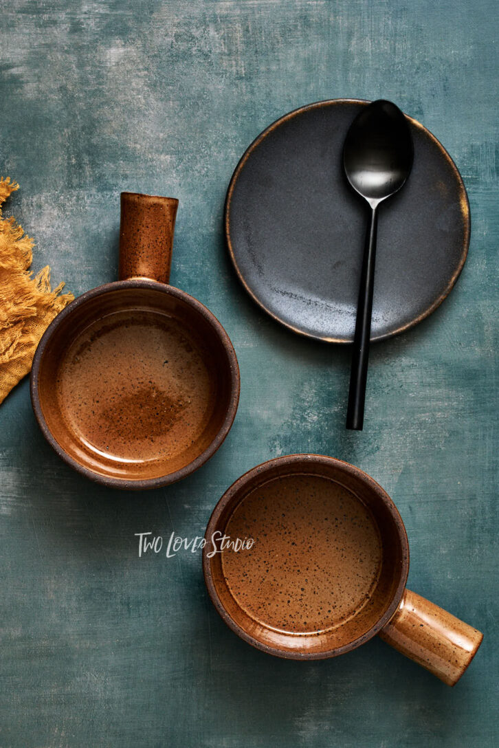 Blue background with a variety of bowls 