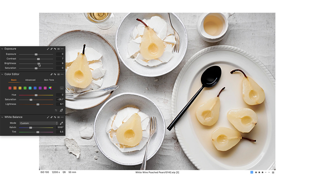 Poached pears and white wine being editing in Capture one for colour correction.