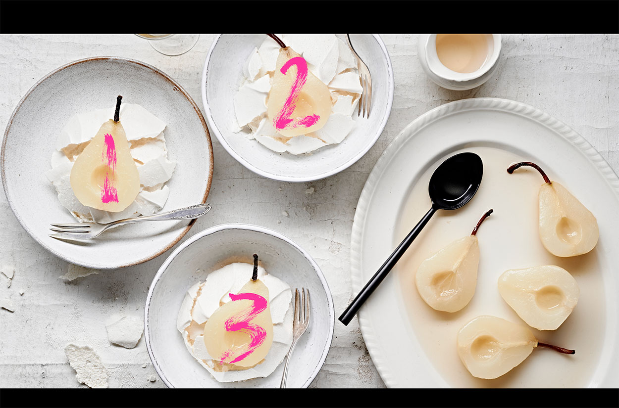 Pinks letters, 1,2,3 on white wine poached pears.